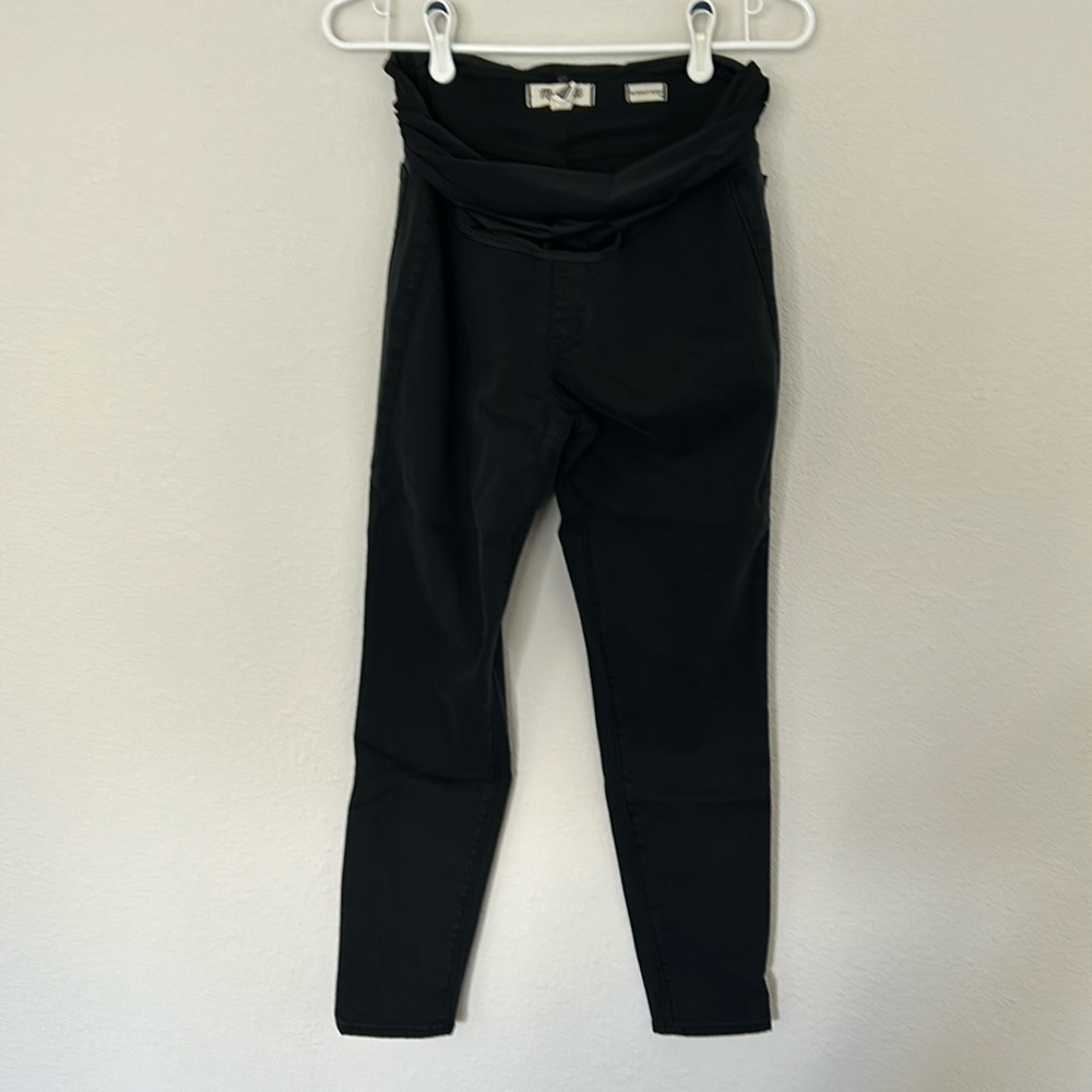 Madewell black maternity skinny jeans with over belly panel.